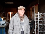 Archaeologist Eric Gleason stands in the doorway of the Wing Hong Hai Company Store in The Dalles' downtown on Wednesday, Dec. 14, 2022. The research and excavations Gleason and his partner, Jacqueline Cheung, have conducted at the store have revealed a deeper history of The Dalles' small but vibrant Chinatown.