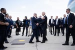 Israel Prime Minister Benjamin Netanyahu (left) greets President Joe Biden upon his arrival at Tel Aviv's Ben Gurion airport on Oct. 18, 2023, amid the ongoing battles between Israel and the Palestinian group Hamas.