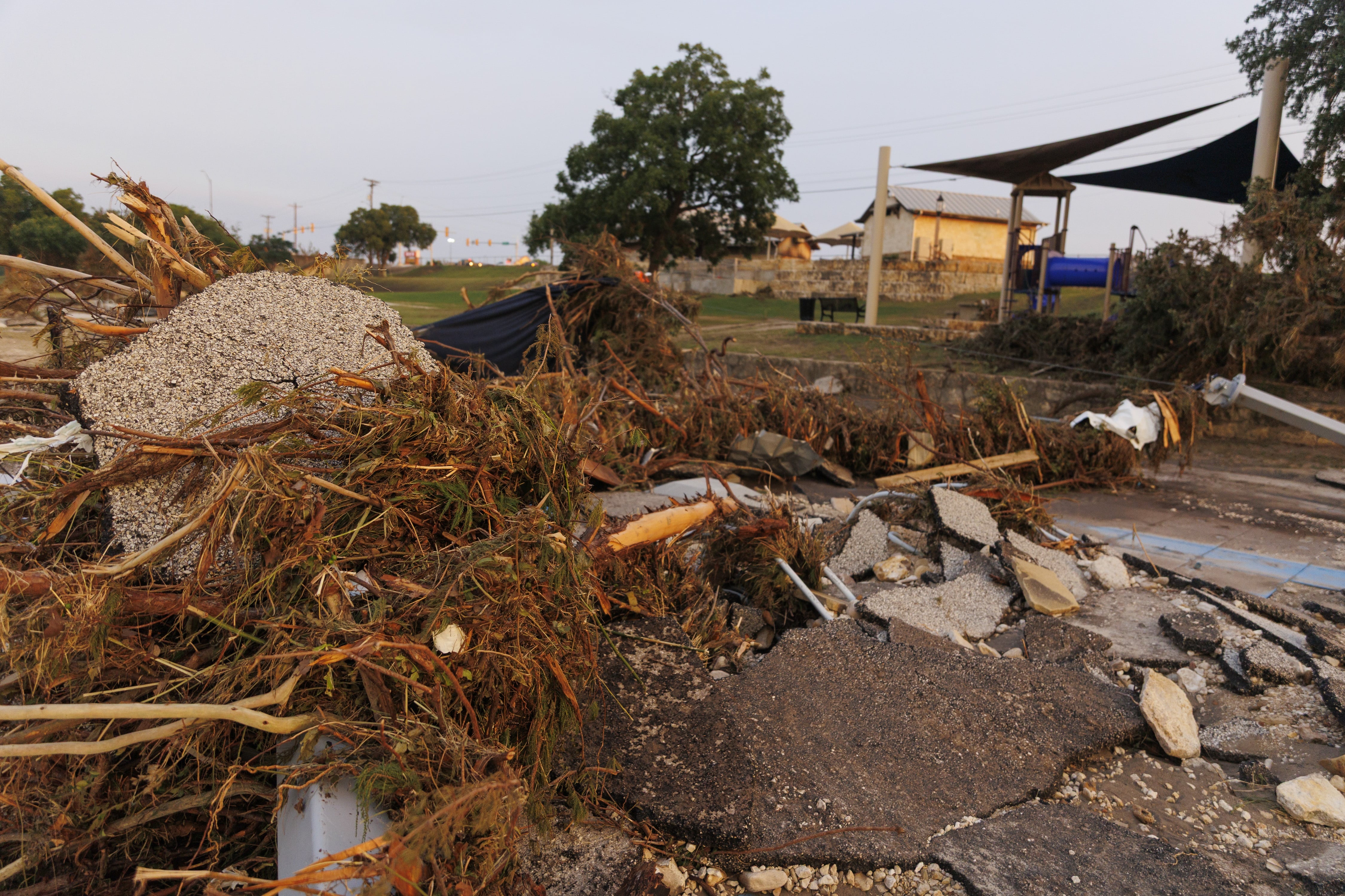 Debris is seen in the Guadalupe River in Kerrville, Texas, on Sunday.