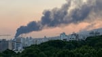 Smoke billows from an explosion at the Islamic Republic of Iran Broadcasting (IRIB) building in Tehran after an Israeli strike hit the building, cutting off live coverage, on June 16.