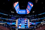 Workers prepare the United Center before the upcoming Democratic National Convention, Wednesday, Aug. 14, 2024, in Chicago.