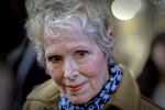 FILE - E. Jean Carroll talks to reporters outside a courthouse in New York, March 4, 2020. Jurors’ names will be kept secret at the upcoming trial of the writer’s rape lawsuit against former President Donald Trump, a judge ruled Thursday, March 23, 2023, citing “a very strong risk” they would otherwise face harassment and more. Anonymous juries are unusual, particularly outside criminal cases. The Associated Press and the Daily News of New York objected to the plan for Carroll's civil case.
