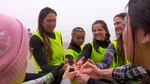 After their lesson, the group (from left) Kelly Potts, Lexi Jackson, Kendall Bell-Tellez, and Nevaeh Jackson, forms a circle and joins hands in this image captured from video footage. Potts says she hopes these bonding experiences will have a lasting impact. 