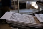 A ballot counting machine runs a batch of test ballots at the Deschutes county offices in Bend on Oct. 14, 2024. The county tested their vote counting system in preparation for the Nov. 5 election, part of their accuracy testing protocol before and after every election.