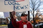 Dean Guernsey, union member and photojournalist participates in a lunchtime picket outside the Bend Bulletin offices in Bend, Ore., on Oct. 28, 2025.