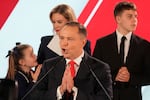 Presidential candidate Karol Nawrocki, a conservative historian backed by the right-wing Law and Justice party addresses supporters at his headquarters after the presidential election runoff in Warsaw, Poland on Sunday.