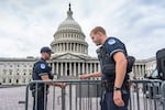 Capitol Police officers adjust security barriers around the East Plaza at the Capitol in Washington, Wednesday, Sept. 24, 2025. With just days to go before federal money runs out with the end of the fiscal year on Tuesday, Sept. 30, Congress has failed to pass legislation to keep the government running after becoming deadlocked during votes late last week.