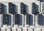 This aerial photo shows rows of cooling vent fans on the roof of a Digital Realty data center in Ashburn, Virginia, in 2025.