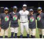 Mark Triolo, center, with members of the junior Venados baseball club in Mazatlán, Mexico.