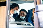 Afghan refugees arrive at a processing center in Chantilly, Va., Monday, Aug. 23, 2021, after arriving on a flight at Dulles International Airport.