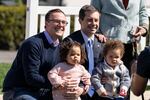 In this file photo from 2023, Pete Buttigieg (R), husband Chasten Buttigieg and their children Penelope and Gus attend the annual Easter Egg Roll on the South Lawn of the White House on April 10, 2023 in Washington, DC.