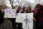 Jessica Mason, 15, Rebekah McLean, 16, and Ridley Liu, 14, at the March For Our Lives in Portland.