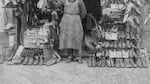 

Nessim Menashe in front of his new and secondhand shoe store in Northwest Portland, which operated until 1921. Circa 1916. 