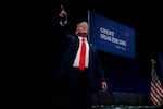 FILE - Former U.S. president Donald Trump points to the crowd as he leaves an event on Medicare at the Sharon L. Morse Performing Arts Center, Thursday, Oct. 3, 2019, in The Villages, Fla.