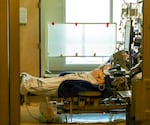 In this Thursday, Aug. 19, 2021, photo, an unidentified patient is monitored at the Critical Care Unit at Asante Three Rivers Medical Center in Grants Pass, Ore. The hospitalization rate of unvaccinated COVID-19 is breaking records and squeezing hospital capacity, with several running out of room to take more patients.