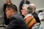 Margaret Calvert, Portland Public Schools’ executive director of school planning and modernization, looks on while a school closure proposal is presented by her team.