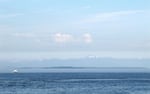 A view of the Olympic Mountains from downtown Seattle. Snowpack was at 0% of normal levels in May. 