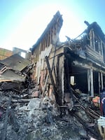 A townhouse is damaged after being hit by the Cessna 421C aircraft in Fairview, Ore., on Aug. 31, 2024.