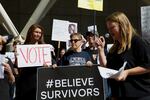 Grayson Dempsey, executive director at NARAL Pro-Choice Oregon, leads protesters in a chant: "Justice for survivors, no Justice Kavanaugh!"