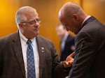 Rep. Mike Nearman, R-Polk County, chats with fellow representatives on the House floor on April 11, 2019, at the Capitol in Salem, Ore. He faces criminal charges after allowing far-right demonstrators to breach the state Capitol in December 2020, and has been expelled from the Legislature.