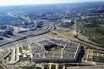 A 2011 file photo of the Pentagon. The Defense Department has threated This picture taken 26 December 2011 shows the Pentagon building in Washington, DC. The Pentagon, which is the headquarters of the United States Department of Defense (DOD), is the world's largest office building by floor area, with about 6,500,000 sq ft (600,000 m2), of which 3,700,000 sq ft (340,000 m2) are used as offices. Approximately 23,000 military and civilian employees and about 3,000 non-defense support personnel work in the Pentagon. AFP PHOTO (Photo by STAFF / AFP) (Photo by STAFF/AFP via Getty Images)