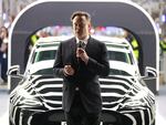 Tesla CEO Elon Musk speaks during the official opening of the new Tesla electric car manufacturing plant on March 22, 2022 near Gruenheide, Germany.