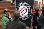 A Patriot Prayer marcher yells at members of the Satanic Portland Antifascists during a Patriot Prayer march on Sept. 15, 2019 in Portland's Pioneer Square.