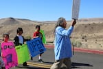 Delson Suppah, Sr. leads three young tribal members in a march at Kah-Nee-Ta. 