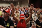 People pray during a "Evangelicals for Trump" campaign event in 2020.