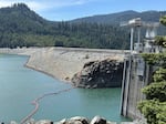 The 65-year-old Hills Creek Dam and Reservoir roughly 4 miles east of Oakridge, on June 24, 2026. Conservationists and tribes have said dams like these have disrupted the migration and breeding cycles of many key fish species, including lamprey. Many now have specially designed lamprey passages to help the fish navigate past the dams, though some advocates say more needs to be done if lamprey numbers are to rebound to their original levels.