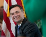 FILE - Oregon Attorney General Dan Rayfield speaks during a town hall held at the Federal Building in Portland, Ore., March 17, 2025.