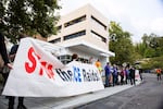 Protesters gather outside the Immigration and Customs Enforcement office in Southwest Portland, Friday, Oct. 11, 2017.