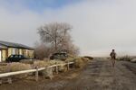 Evered anxiously checks on buildings at the field station during the occupation of the refuge.