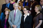 Minority Leader Carl Wilson and Speaker of the House Tina Kotek pose for a group photo during the opening of the 2019 Oregon legislative session in Salem, Ore., Monday, Jan. 14, 2019.