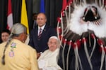 Pope Francis meets the Canadian Indigenous people as he arrives at Edmonton's International airport, Canada, on Sunday.