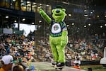 Sluggo, the Eugene Emeralds mascot, entertains the crowd. General manager Matt Dompe hopes the major league lockout might give minor league teams an attendance boost.
