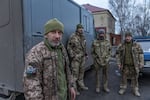 Serhii, 58, (left) driver-paramedic, commender of medical evacuation unit "Shark" of 117th Separate Heavy Mechanized Brigade born in Kropyvnytskyi and other members of the unit at Dnipropetrovsk and Donetsk regions border.