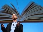 Amazon founder Jeff Bezos speaks at an event unveiling the Kindle 2.0 in 2009. Bezos founded the company in his Bellevue, Wash. garage 30 years ago on July 5, 1995.