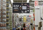 A sign advertises jewelry, furniture and appliances at Bed Bath & Beyond in Los Angeles in 2013.