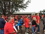 School teachers and community members spilled into the courtyard at the Battle Ground Public Schools board meeting Monday night after the room filled to capacity.