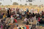 \People who fled the Zamzam camp for the internally displaced after it fell under RSF control, rest in a makeshift encampment in an open field near the town of Tawila in war-torn Sudan's western Darfur region on April 13, 2025.
