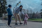 Olena Hunchenko with small children in the center of Sloviansk city, Donetsk region.