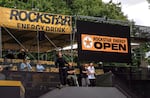 Parents and onlookers watch skaters practice for the Rockstar Energy Open in Portland, Ore., Aug. 14, 2025. The event takes place Aug. 15-17.