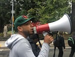 Protesters lead the "Black Lives Matter" chant on the march to Portland Mayor Charlie Hales' house.