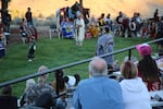 Tourists gather to watch young women do a traditional dance during the final weekend of operation at Kah-Nee-Ta.