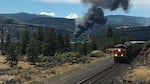 Train derailment fire as seen from Coyote Wall area on Washington state Route 14.