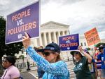 Environmental activists rally in front of the U.S. Supreme Court in 2022 after it ruled against the Obama administration's plan to cut climate-warming emissions at the nation's power plants. The Supreme Court has since further limited the power of federal agencies like the Environmental Protection Agency.