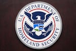U.S. Department of Homeland Security sign, is seen during a news conference at ICE Headquarters, Friday, Oct. 9, 2026, in Washington.