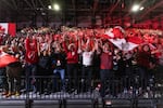 People cheer and wave flags at a rally hosted by Forever Canadian on Canadian Unity at the Edmonton Expo Center in Edmonton, Alberta, Canada on Oct.16, 2026.