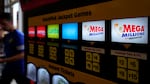 A lottery ticket vending machine in a convenience store, July 21, 2022, in Northbrook, Ill. Tuesday's numbers were: 07-29-60-63-66, Mega Ball: 15.